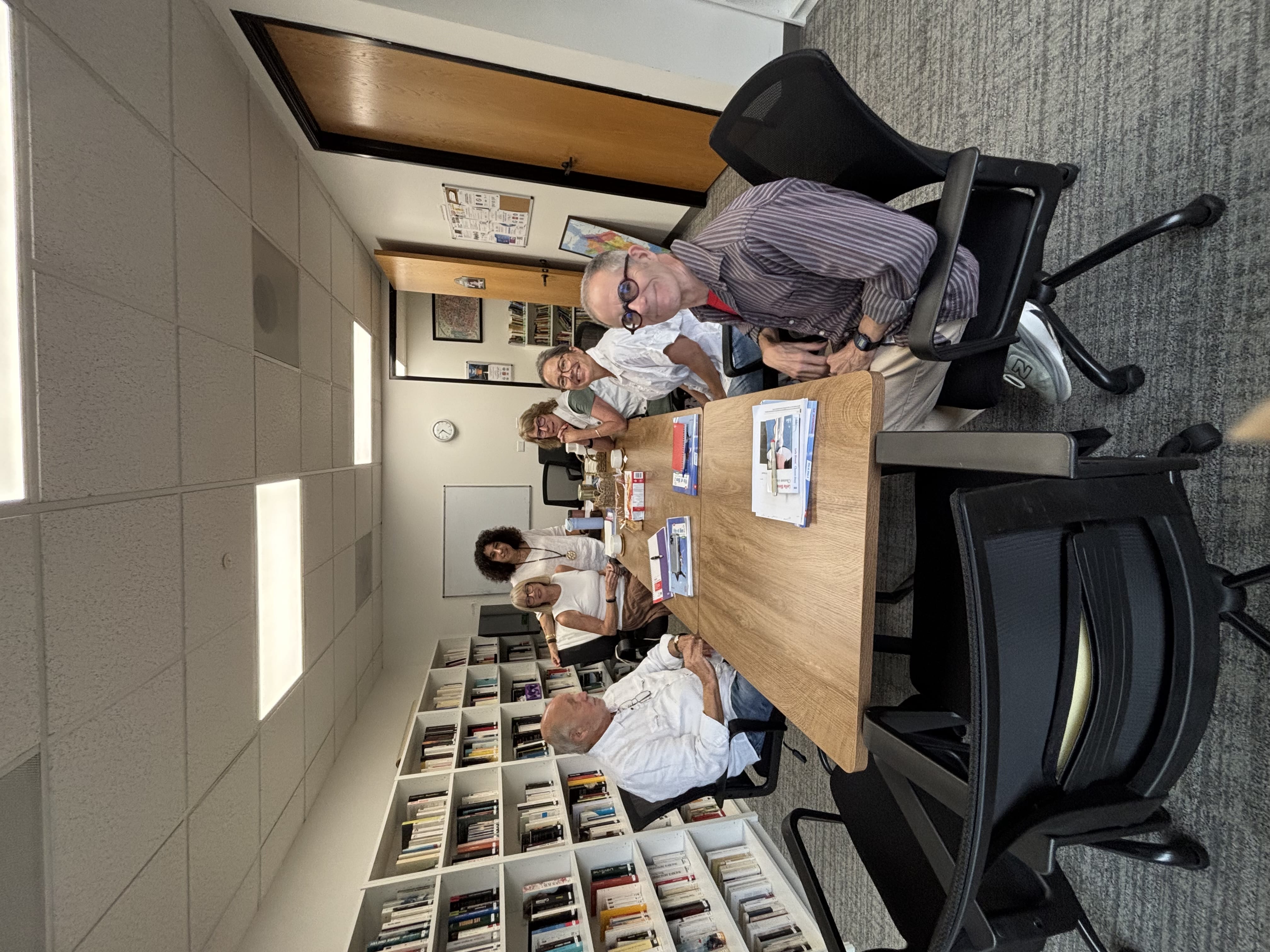 Adult students studying together in a French language class at Alliance Française de San Diego